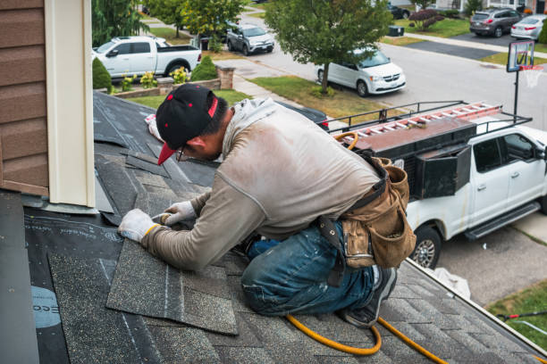 Professional Emergency Roof Repair technician working in De Soto, IA